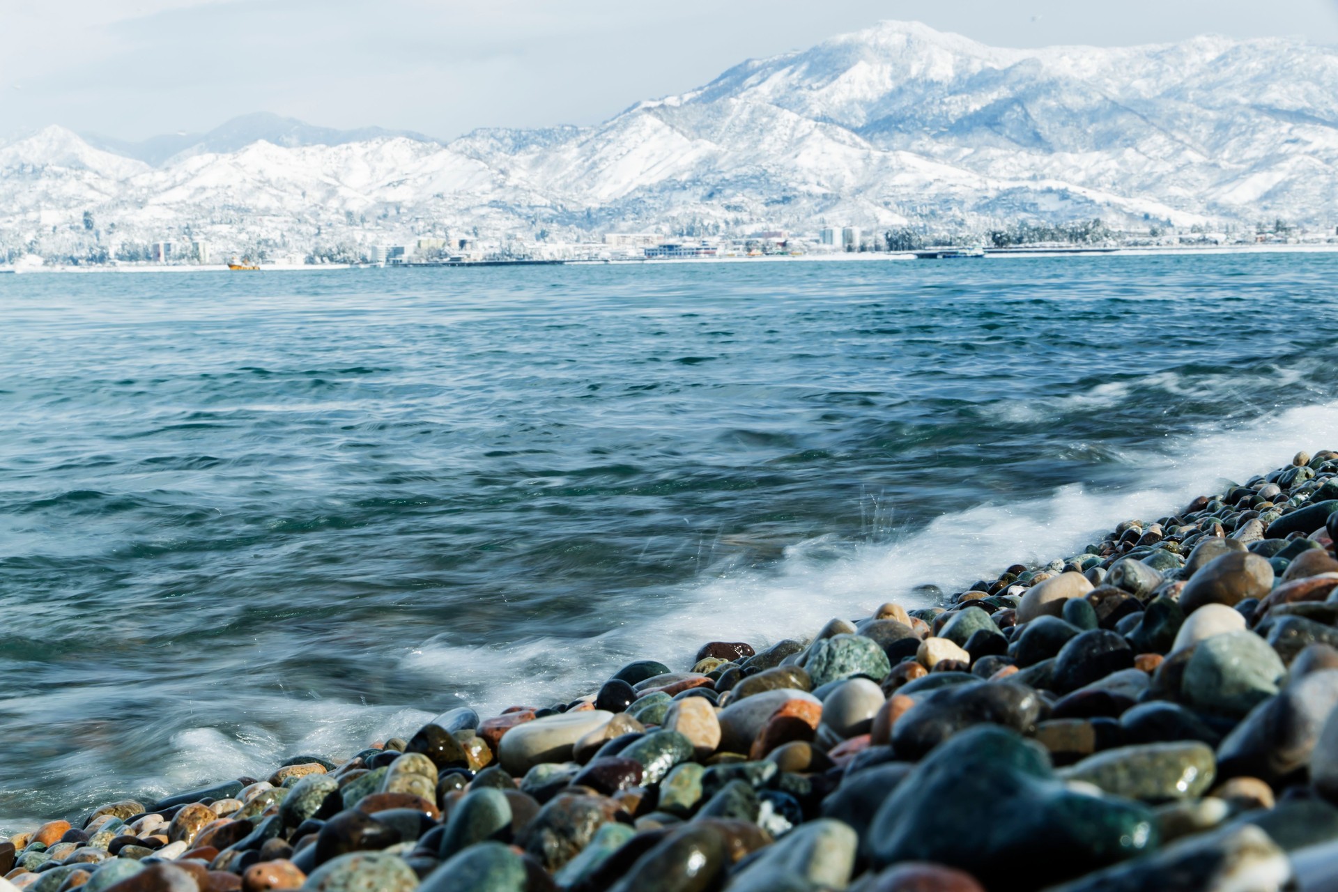 Landscape black sea on background snow mountains of Georgia