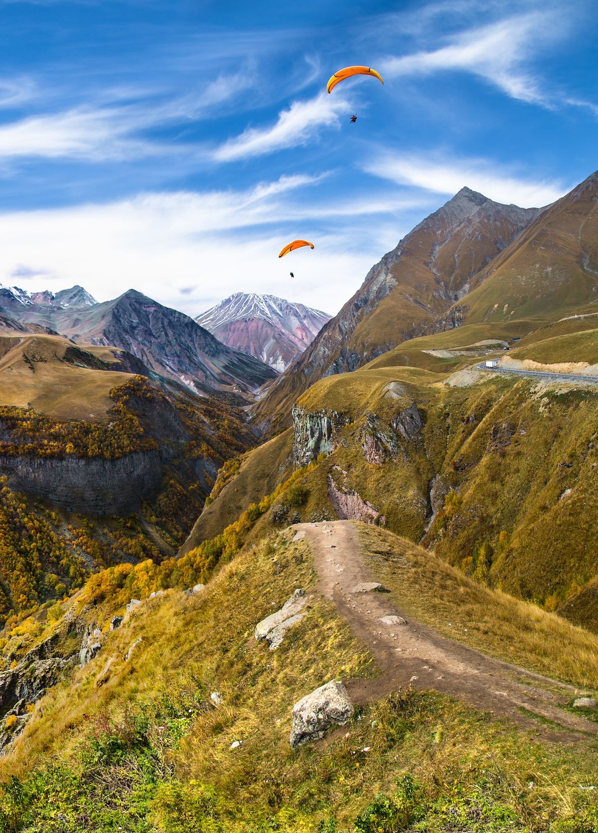 Paragliding over mountains of Gudauri.  Georgia. Europe.